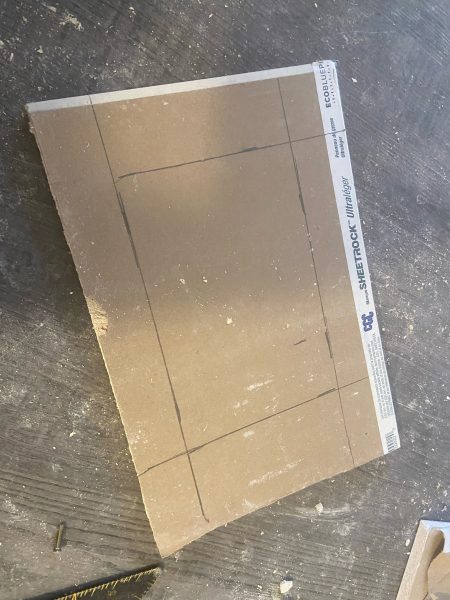 mark drywall hole patch